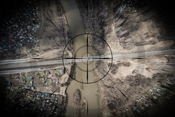 Close-up, a small town, a village with small houses, a river, a bridge, roads and other...