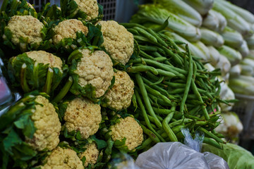 Traditional asian market. Fruits and vegetables at a farmers market. Organic fresh agricultural product.