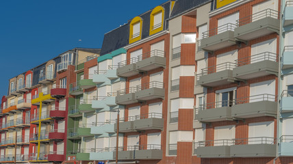 Mers-Les-Bains, France - 04 29 2019: Facades along the dike at sunset