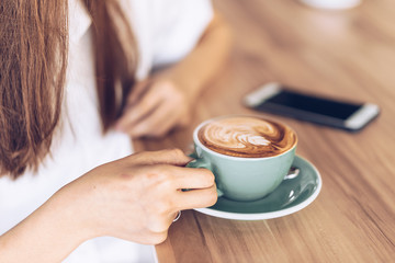 woman with cup of coffee