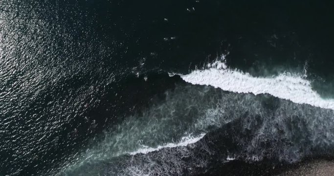 Surfer riding long wave in tropical beach. Aerial video with Airflow Creations travel destination for relaxing SLOW MOTION colorful coast.