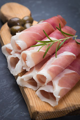 Slices of cured prosciutto ham