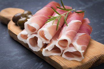 Slices of cured prosciutto ham