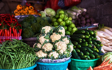 Farmers market with various domestic colorful fresh fruits and vegetable. Tasty colorful mix. Healthy delicious organic food concept.