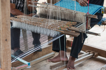 Women are weaving With ancient weaving