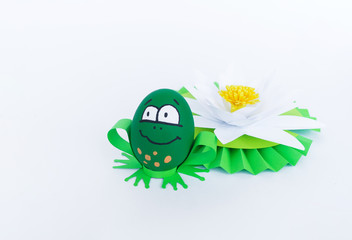 Waterlily flower made of paper. white background. Origami hobby. Gentle petal.