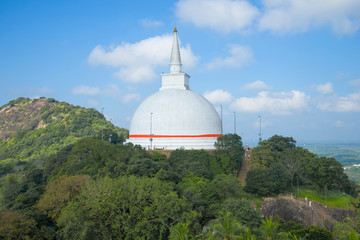 View of the ancient Buddhist stupa by Mahaseya Dagoba. Mihintale, Sri Lanka