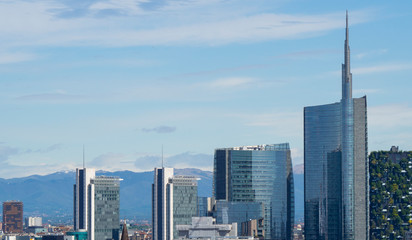 Obraz premium Milano, Italy. Panorama of the city and the skyscraper from the roof terrace of the cathedral, Duomo of Milano