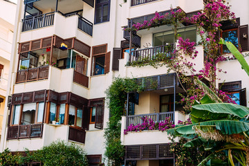 Fototapeta na wymiar balconies decorated with flowers