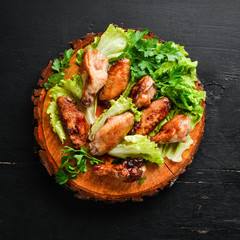 Baked chicken wings. Barbecue. Top view. Free space for your text.