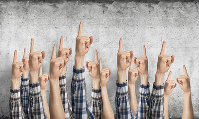 Obraz premium Row of man hands showing finger pointing gesture