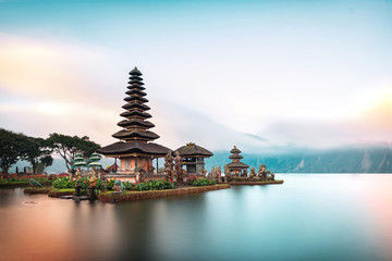 Ulun Danu Beratan Temple is a famous  landmark located on the western side of the Beratan Lake , Bali ,Indonesia. - obrazy, fototapety, plakaty