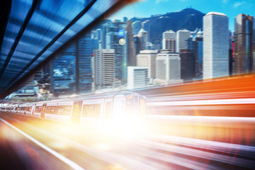 Fototapeta na wymiar Motion blur of high speed train moving in Hong Kong