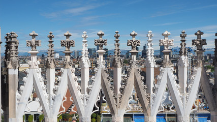 Milano, Italy. The spires of white marble that adorn the entire cathedral. Mix of spires cleaned from black due to pollution and some still dirty. The Duomo is the most famous landmark in Milan © Matteo Ceruti