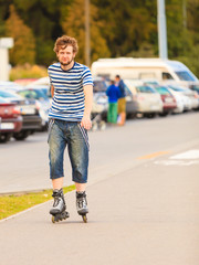 Young man rollerblading outdoor on sunny day