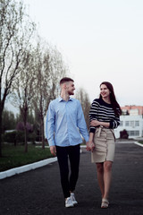 Fototapeta premium Beautiful coule walking outdoors