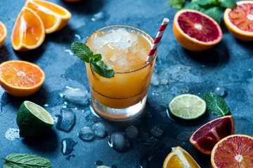 Summer cocktail with crashed ice, juicy summer drink with citrus fruits