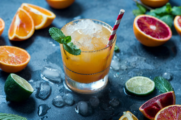Summer cocktail with crashed ice, juicy summer drink with citrus fruits