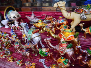colorful display with typical Camel souevenirs, Mutrah Souk (bazaar) in the old town of Muscat, Oman, Middle East