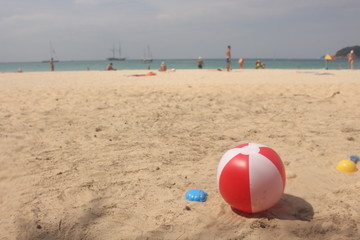 beachball and toys on the beach