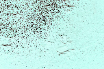 Vintage cyan background. Rough painted wall of hazel color. Imperfect plane of brown colored. Uneven old decorative toned backdrop of blue tint. Texture of azure hue. Ornamental stony surface.