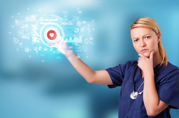 Doctor touching hologram screen displaying medical symbols and charts
