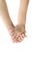 The closeup image of the older sister holding hands with the younger brother, Children are playing together and they will grow together.