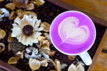 taro latte art top view on wood table 