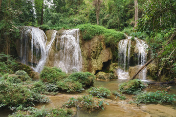 Fototapeta na wymiar Natural waterfall in Asian country.