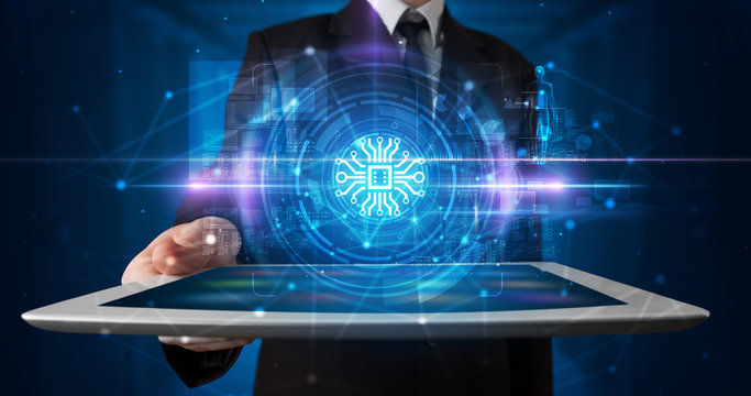 Hand holding tablet with online security and data protection concept
