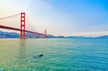 View of Golden Gate Bridge in San Francisco on a sunny day.