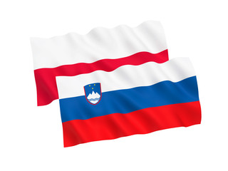 National fabric flags of Poland and Slovenia isolated on white background. 3d rendering illustration. 1 to 2 proportion.