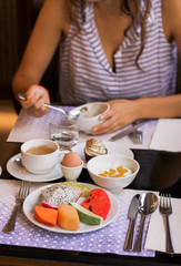 healthy breackfast for two with fruits egg and coffee