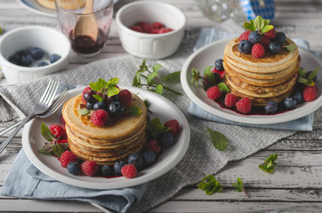 Pancakes with forest fruit sauce