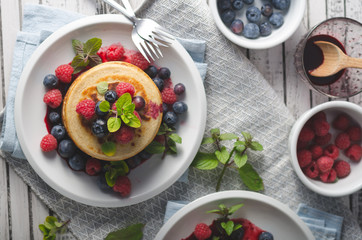 Pancakes with forest fruit sauce