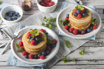Pancakes with forest fruit sauce