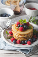 Pancakes with forest fruit sauce