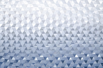 Abstract modern metallic triangular wall pattern. Silver triangle geometric art wallpaper. Background or backdrop design for futuristic concept 