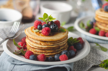 Pancakes with forest fruit sauce