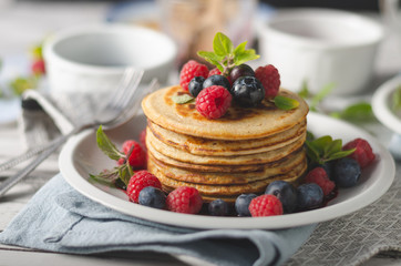 Pancakes with forest fruit sauce