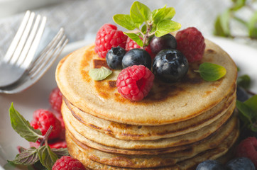 Pancakes with forest fruit sauce