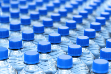 Five plastic bottles of still water with blue cap