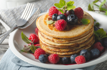 Pancakes with forest fruit sauce