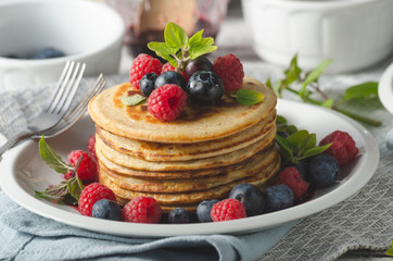 Pancakes with forest fruit sauce