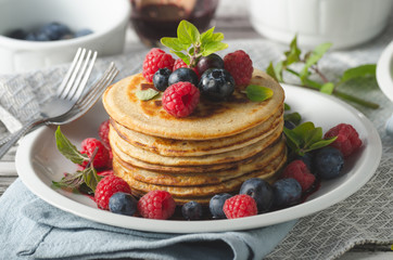Pancakes with forest fruit sauce
