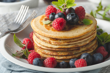 Pancakes with forest fruit sauce