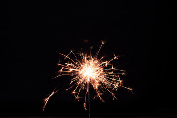 Fototapeta premium Sparkler background. Christmas and new year sparkler holiday background