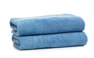 Clean color folded towels on white background