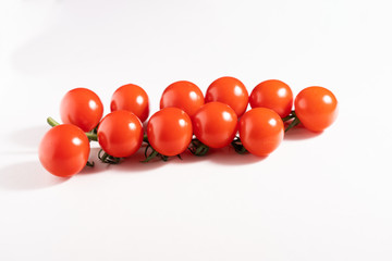 Cherry tomatoes isolated on the white background