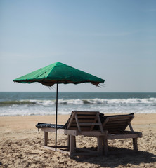 Umbrella and sun beds on the beach in goa